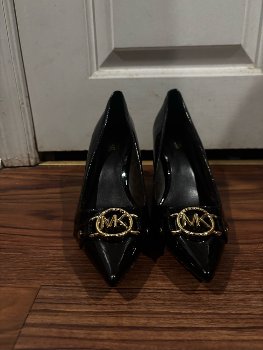 Michael Kors Black Patent Pointed Pumps with Gold MK Logo